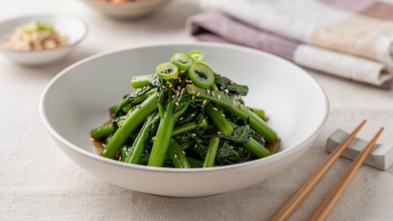 두릅 효능 — Korean dureup seasoned namul dish in white bowl, s